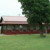 40'x40' RESIDENCE (#3 of 4) with gable overhangs, 6' porches on 3 sides, 12' porch on 1 side, and wainscote,  (August - 2004)