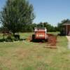 20x24x10 shop (#1 of 5) breaking ground, marking concrete driveway site (June, 2009)